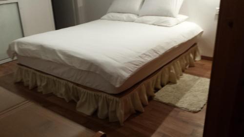 מיטה או מיטות בחדר ב-Alona