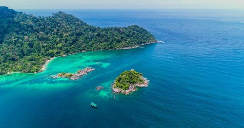an aerial view of an island in the ocean at Forra Dive Resort Sunrise in Ko Lipe