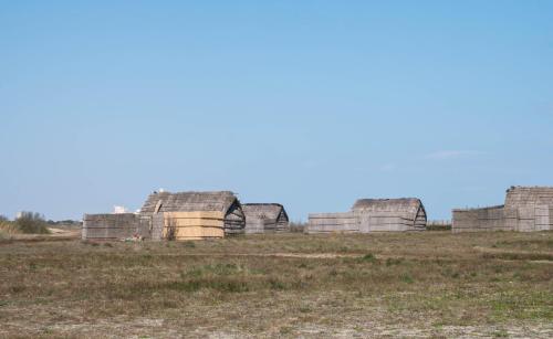 a group of domed buildings in a field at ibis Styles Perpignan Canet En Roussillon in Canet-en-Roussillon