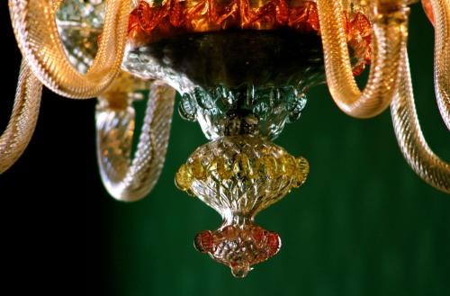 a close up of a chandelier with gold at Palazzo Cendon Piano Antico in Venice