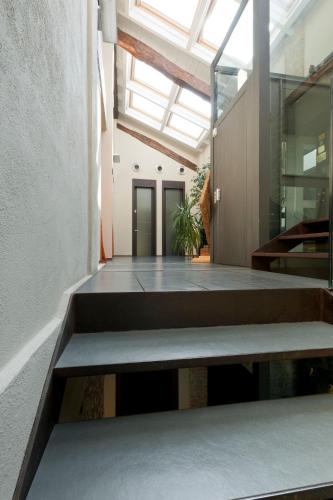 an open hallway with a bench in a building at Locanda Sant'Ambrogio in Rivalta