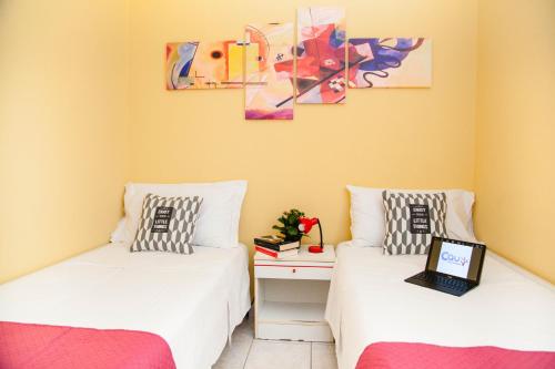 Postel nebo postele na pokoji v ubytování Casa Vacanze Cau