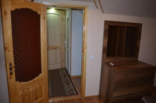 an empty room with a door and a closet at Light House Old City in Akhaltsikhe