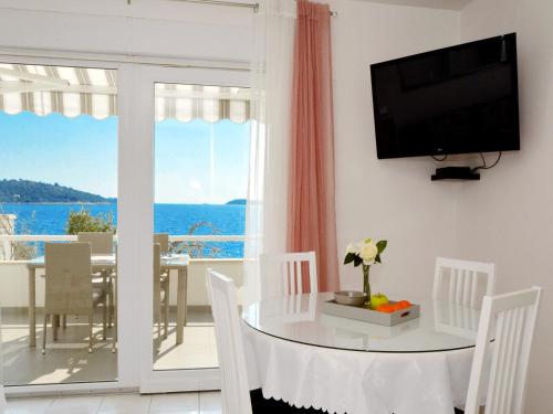 TV a/nebo společenská místnost v ubytování Beach Apartments Tina