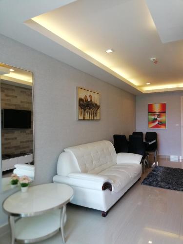 Ruang duduk di Cosy Beach View Apartments