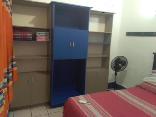 Ein Bett oder Betten in einem Zimmer der Unterkunft Hostal Mixteco Naba Nandoo