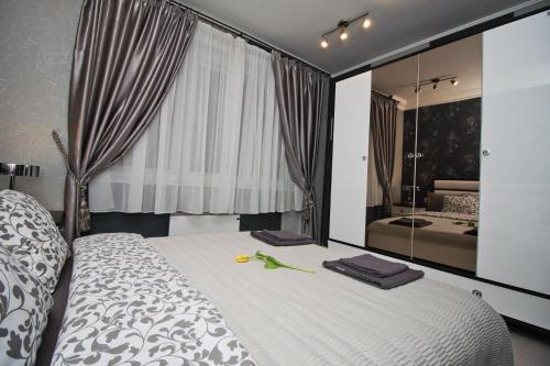 En eller flere senge i et værelse på Apartment Lovac