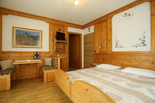 Postel nebo postele na pokoji v ubytování Garni Miravalle