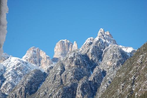 a view of a mountain range with snow at Albergo Ristorante Cacciatori in Auronzo di Cadore