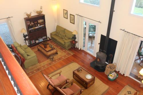 an overhead view of a living room at Luxury VILLA CAMÉLIA. Mountains, golf, horses, levada walks. in Santo António da Serra