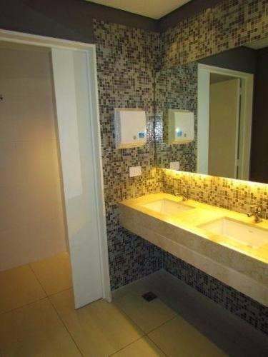 a bathroom with two sinks and a large mirror at Amazing Apartament in Buenos Aires