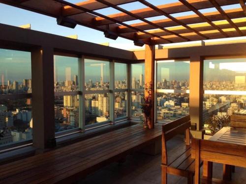 a balcony with a view of a city skyline at Amazing Apartament in Buenos Aires