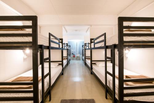 Postel nebo postele na pokoji v ubytování Sindy's Hostel