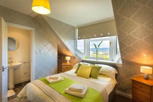 Voodi või voodid majutusasutuse Neptunes Rest Guest Hotel toas