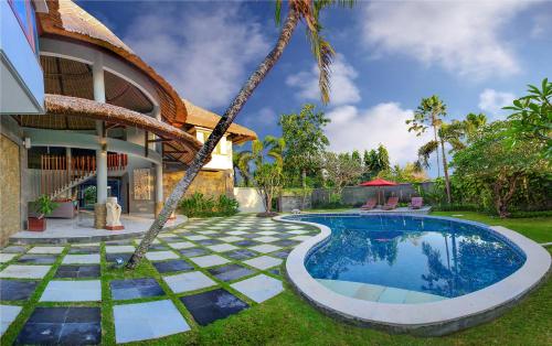 The swimming pool at or close to Abi Bali Resort and Villa