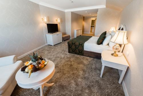 Karinna Hotel Convention Center & Spa Luxury - Full Board Plusにあるベッド