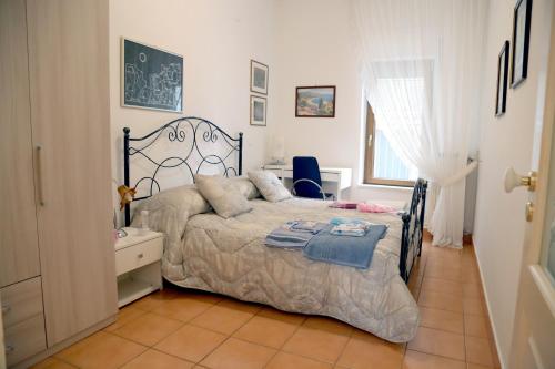 Posteľ alebo postele v izbe v ubytovaní La Casa Dei Pargoli