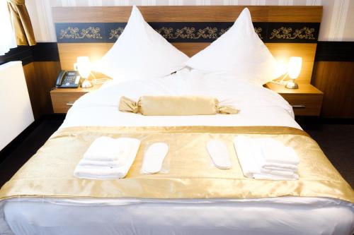 Katil atau katil-katil dalam bilik di Hotel im Anker