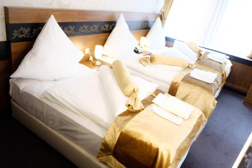 Katil atau katil-katil dalam bilik di Hotel im Anker