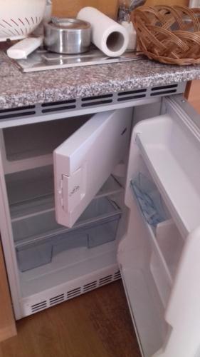 Dapur atau dapur kecil di Apartment Zlatoperka