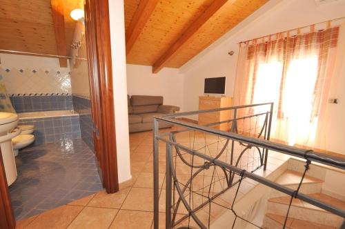TV a/nebo společenská místnost v ubytování Apartments Cetara