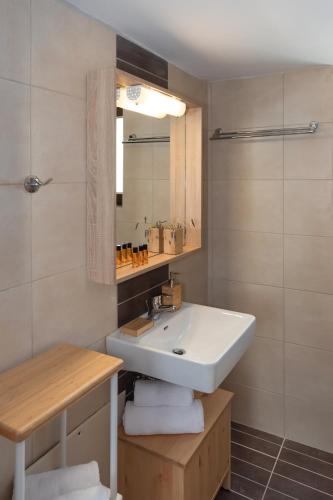 Koupelna v ubytování Syra Suites