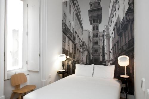 Lisbon Serviced Apartments - Baixa tesisinde bir odada yatak veya yataklar