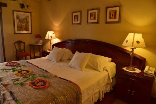 เตียงในห้องที่ Villa Vicuña Wine & Boutique Hotel