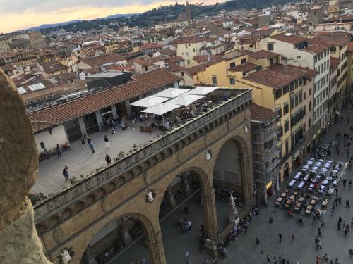 an aerial view of the arc de triomphe and the city at La Federiga in Florence