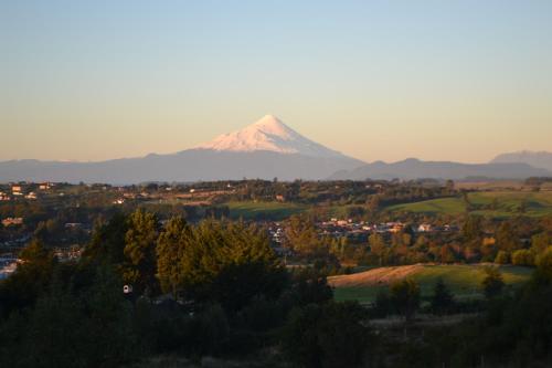 a view of a mountain in the distance at Cabañas Krause Lodge in Puerto Varas