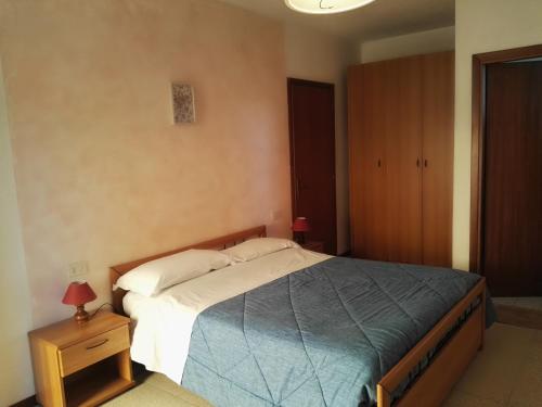 Postel nebo postele na pokoji v ubytování Camere Carloni