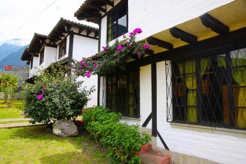 Un jardín fuera de Hostal Inti Luna