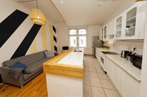 A kitchen or kitchenette at Apartment Na Kozacce 6