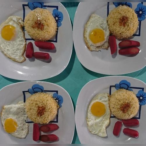 four plates of food with eggs and hot dogs on them at Prince Transient house in San Jose