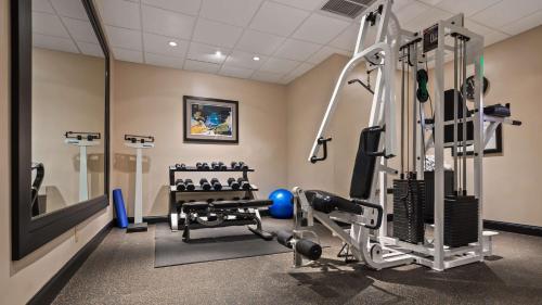 a gym with a treadmill and a weight room at Best Western Plus Hollywood/Aventura in Hollywood
