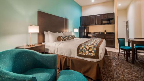 Säng eller sängar i ett rum på Best Western Plus/Executive Residency Elk City
