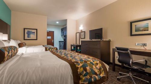 Ένα ή περισσότερα κρεβάτια σε δωμάτιο στο Best Western Plus/Executive Residency Elk City