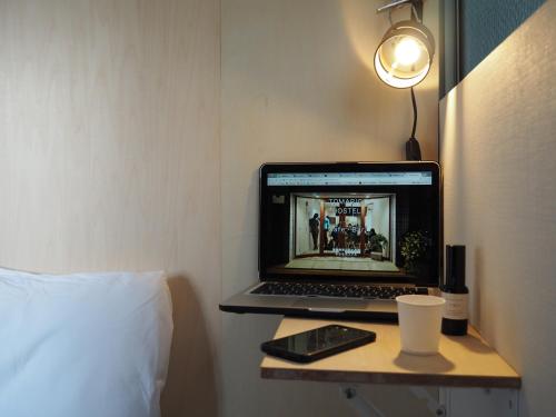 TV a/nebo společenská místnost v ubytování Tomarigi Hostel