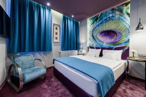 Postel nebo postele na pokoji v ubytování RQ Boutique & Unique Hotel