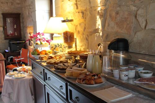 a buffet with a lot of food on a table at Tenuta Zannafondo in Donnafugata