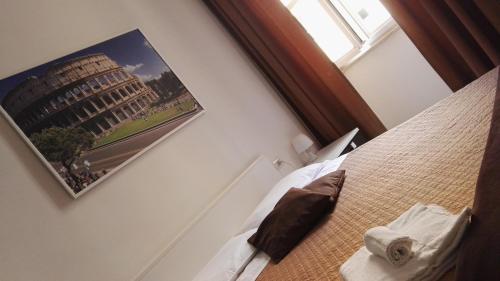 Cama o camas de una habitación en Cialdini Rome