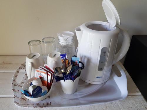 a coffee maker sitting on top of a counter at Outeniqua en Route in George