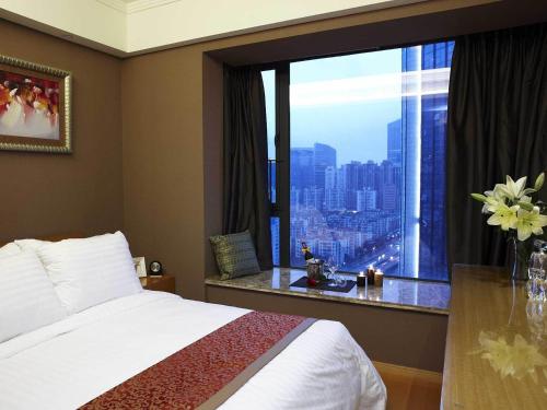 Photo de la galerie de l'établissement Dan Executive Hotel Apartment Zhujiang New Town, à Canton