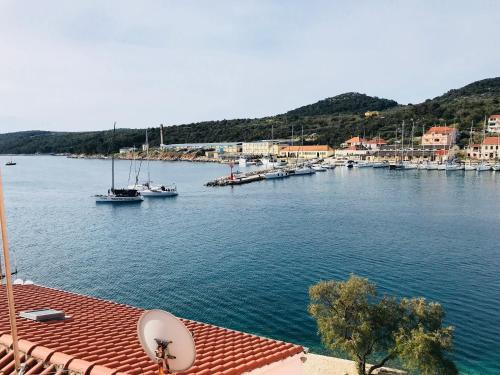 a view of a harbor with boats in the water at Apartmani Sali Seaview in Sali