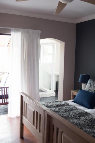 Katil atau katil-katil dalam bilik di Annie's Boutique Guesthouse and Garden Spa