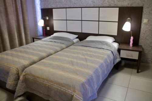 Posteľ alebo postele v izbe v ubytovaní Villa Niovi