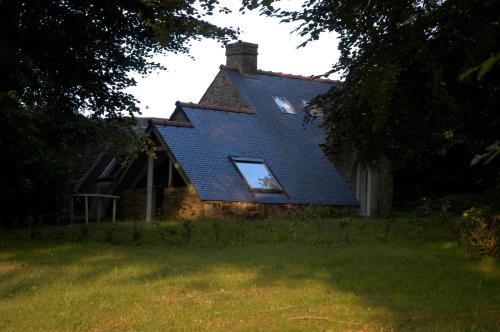 a roof of a house with a window on it at Domaine de Keravel in Plouha