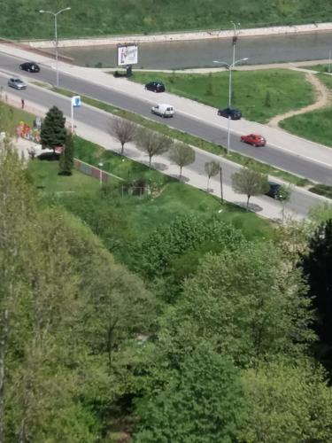 a highway with cars driving down a road at Blue New Yorker in Niš