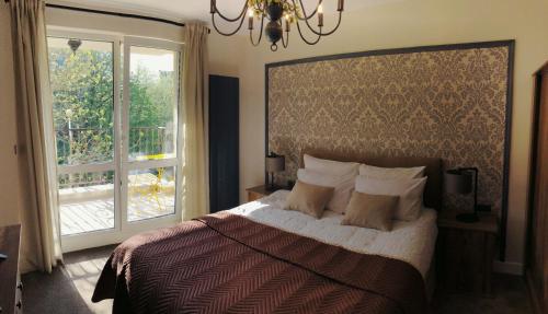 Postel nebo postele na pokoji v ubytování habitat Holiday Apartment