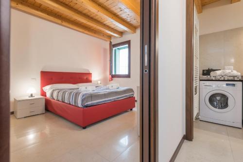 מיטה או מיטות בחדר ב-Dimore Verona Residenza Zeno